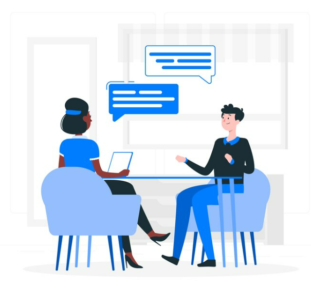 Two professionals discussing regulatory requirements, representing ARC’s compliance management system and real-time compliance management tools.